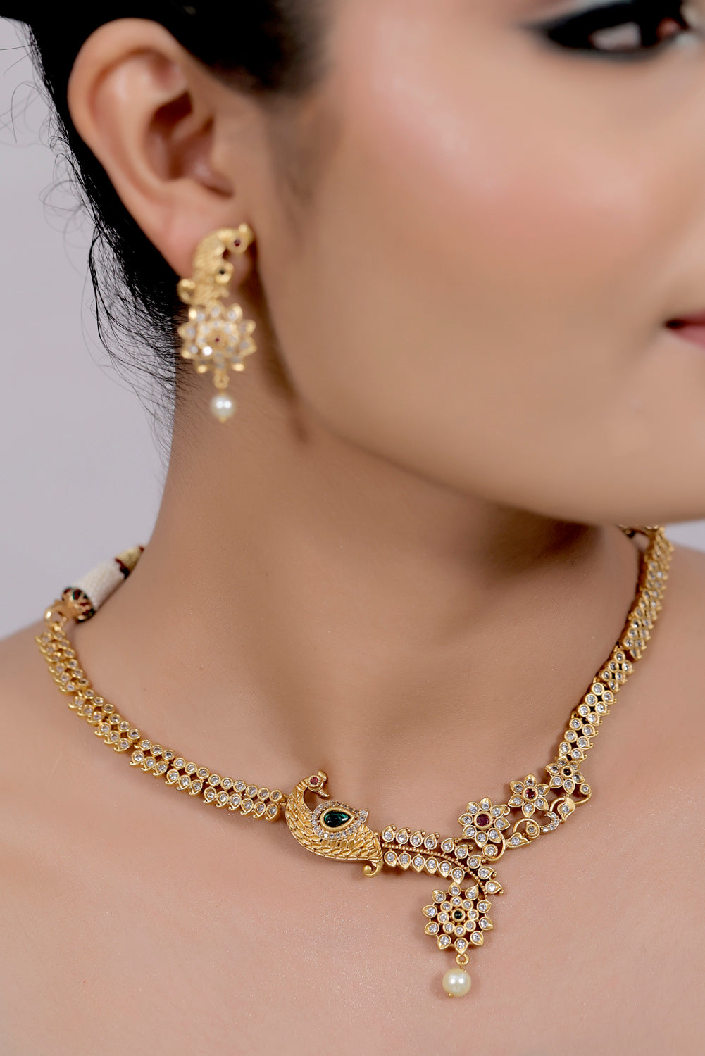 peacock gold necklace