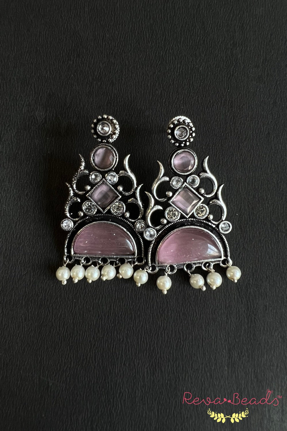 Tribal stud earrings trse230317