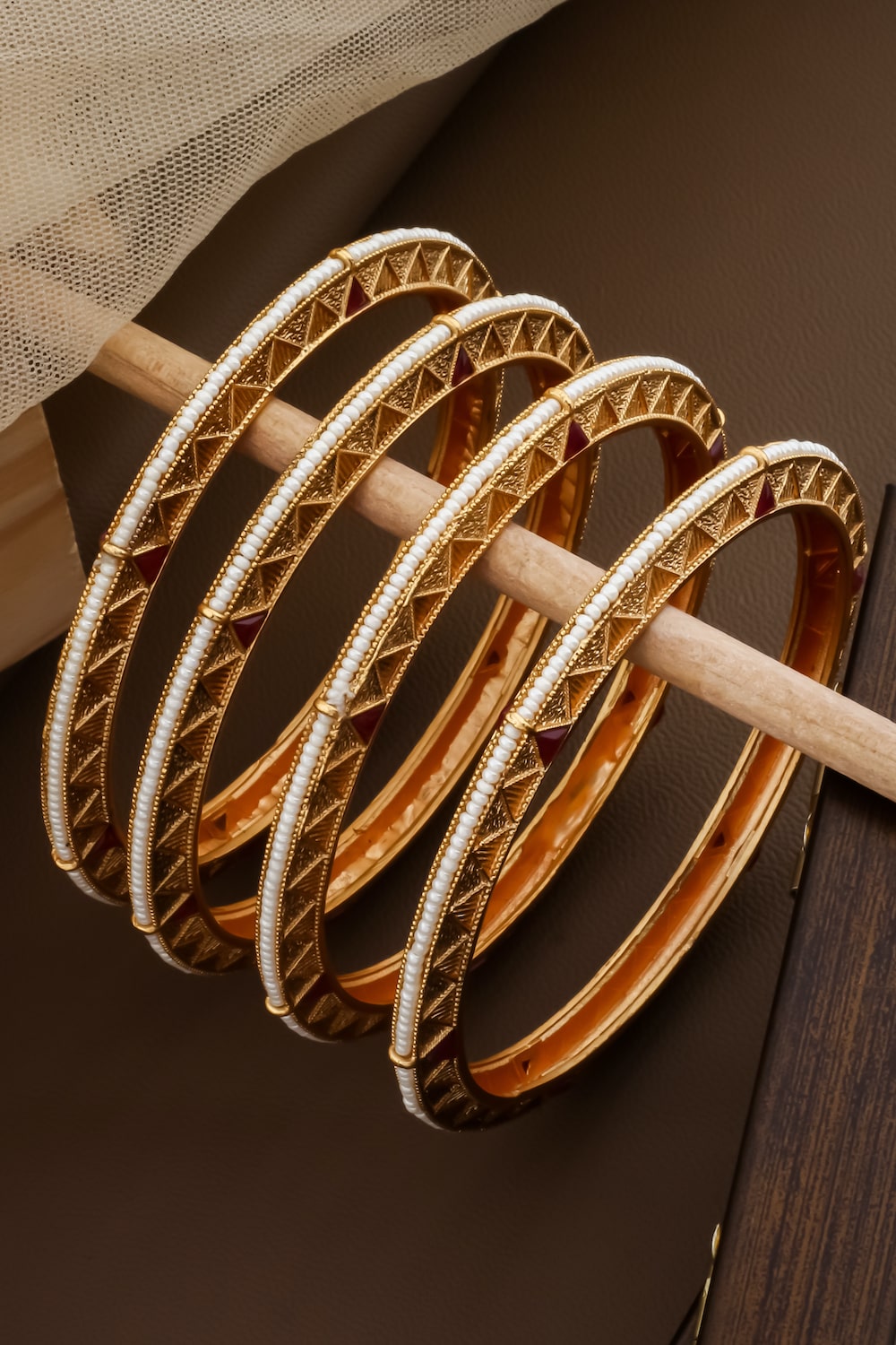 Temple triangle design gold finish bangles set