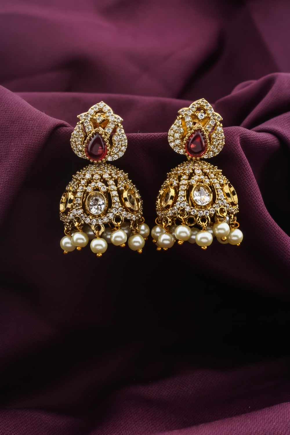 Ad zircon victorian gold finish jhumka earrings