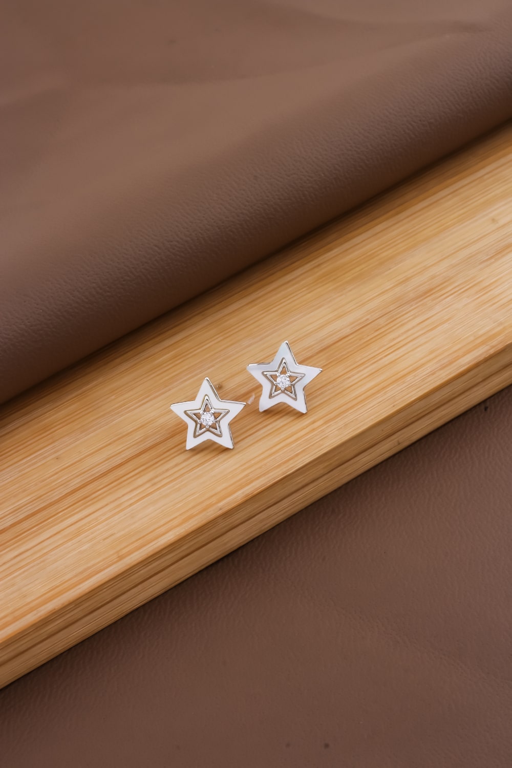 delicate star studs