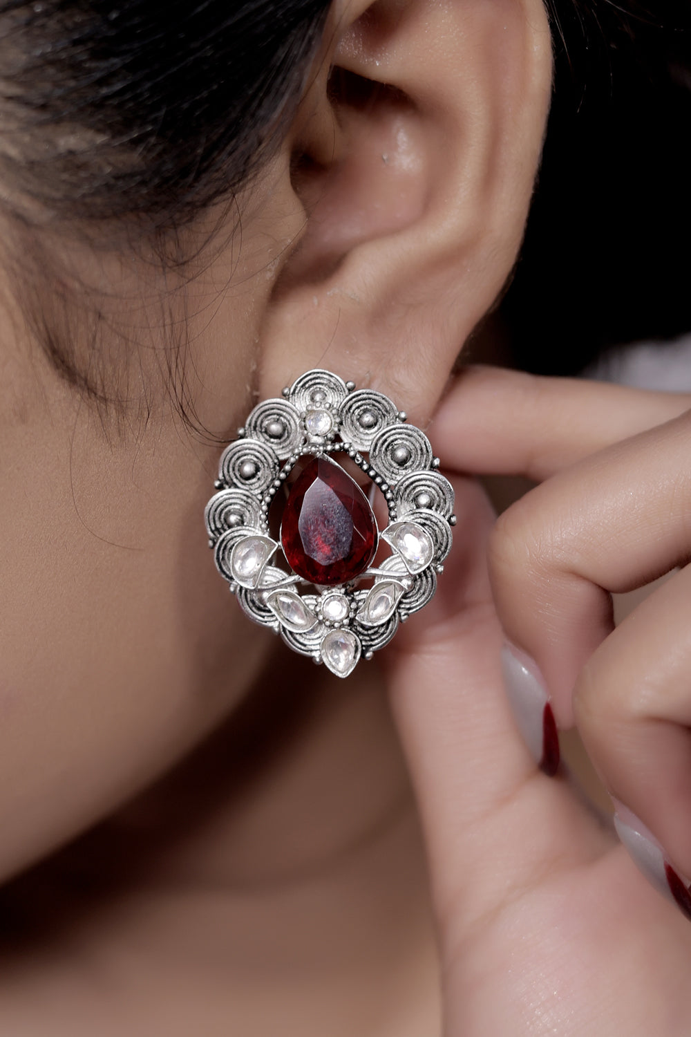 red doublet silver antique studs