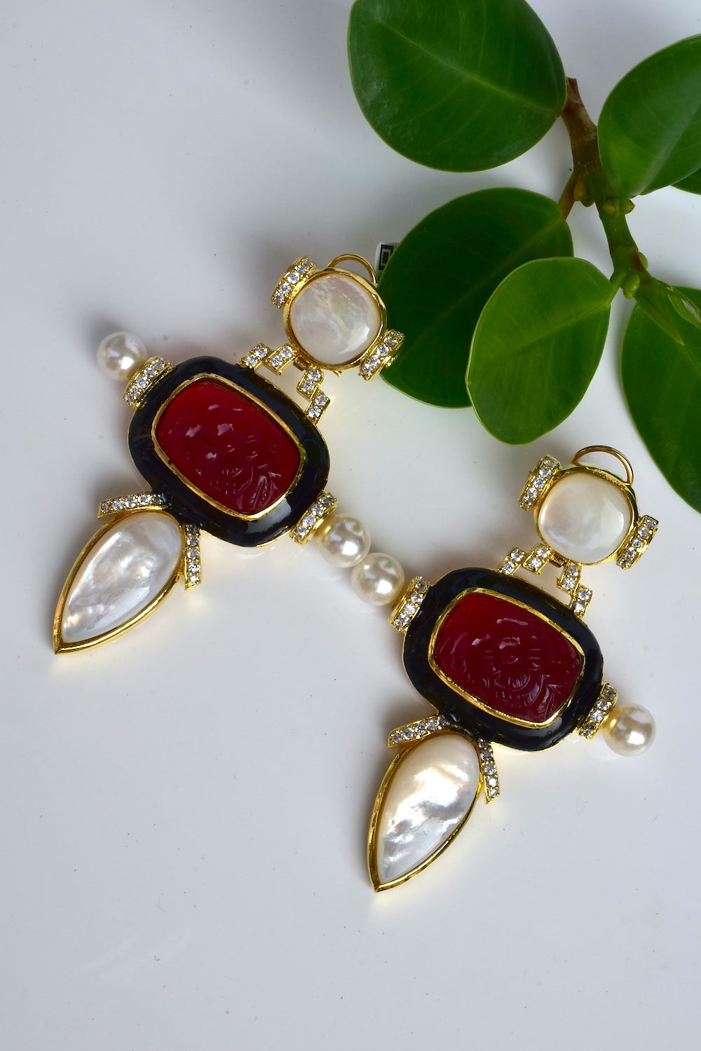 ad gold polish earrings