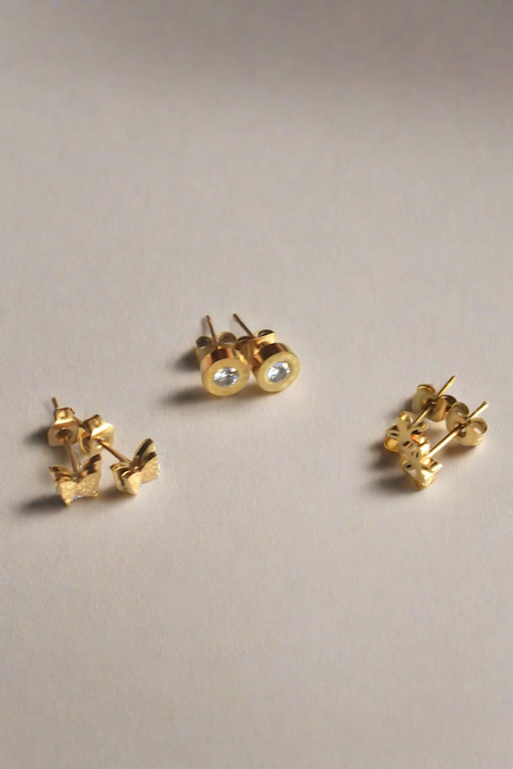 Minimalist gold polish stud earrings migpse231003