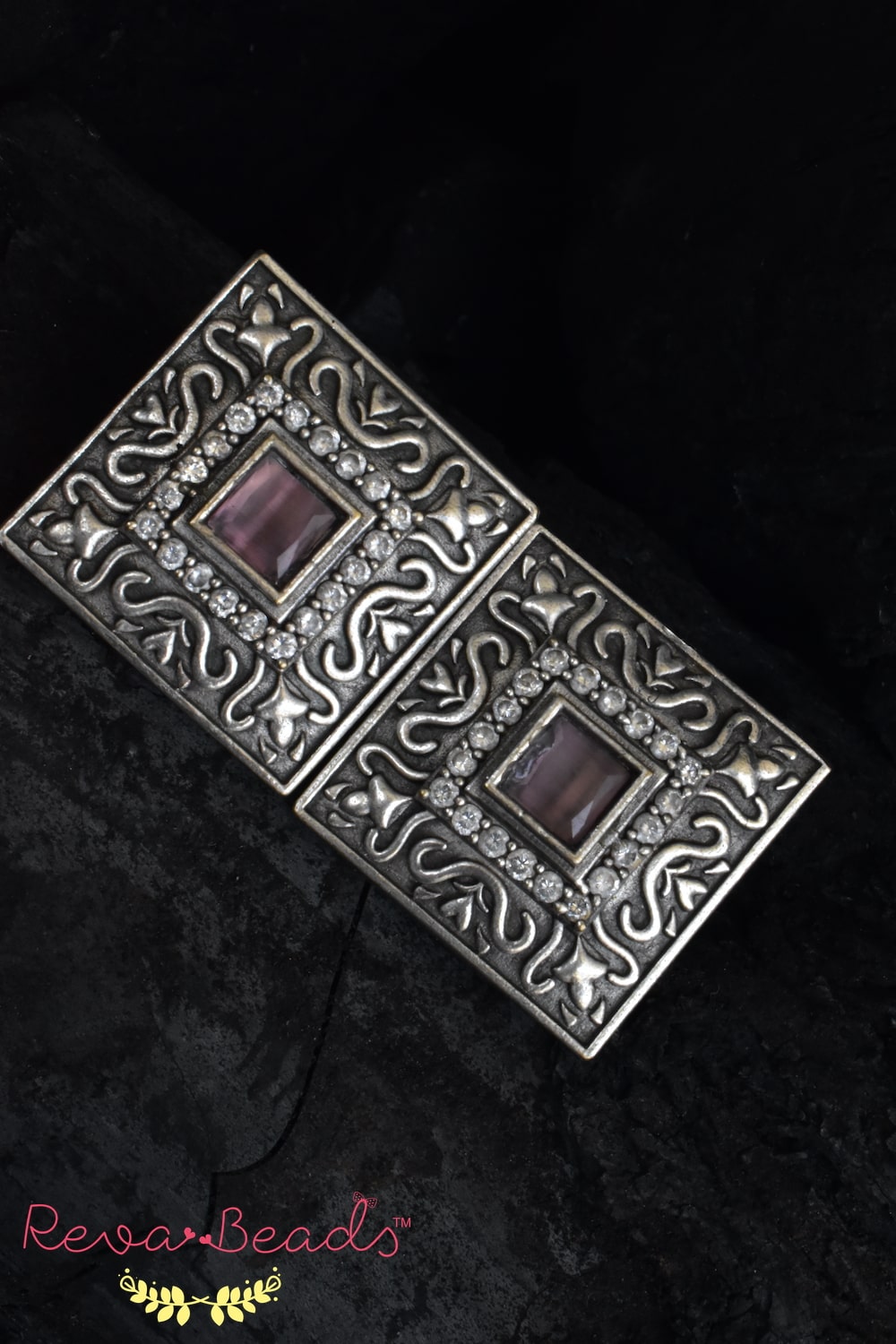 pink silver studs