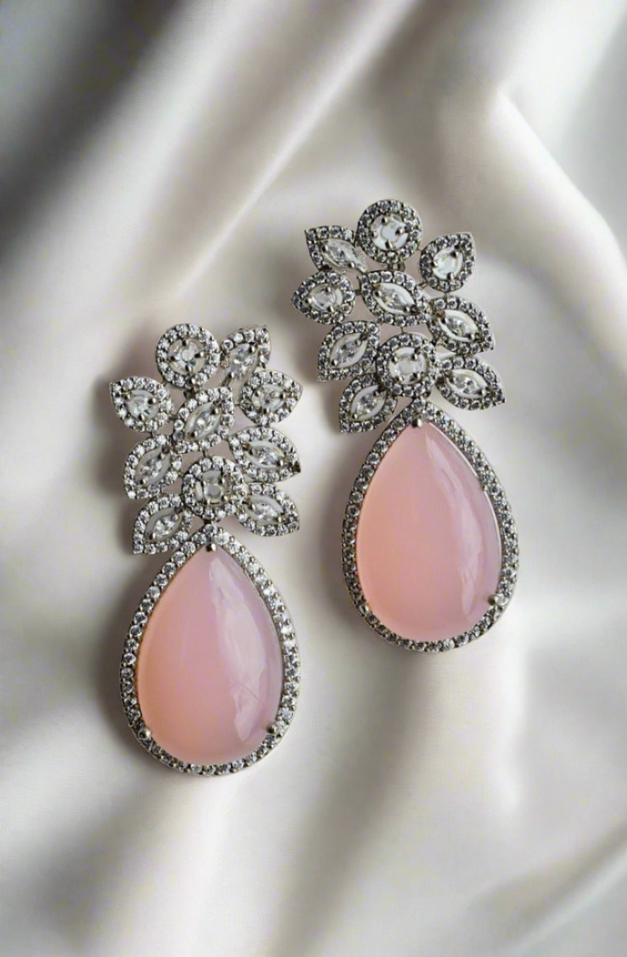 pink flourish design earrings