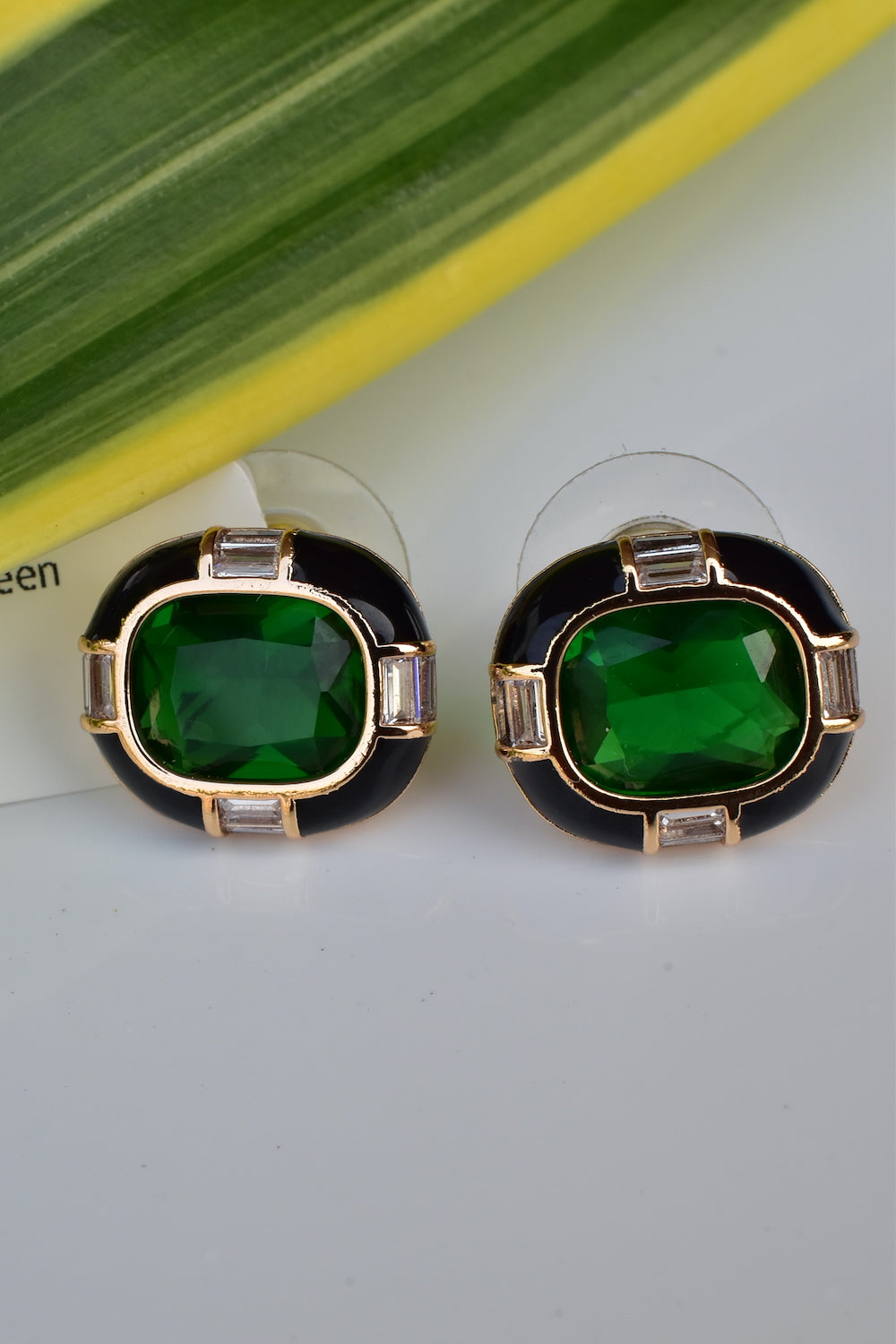 emerald green black studs