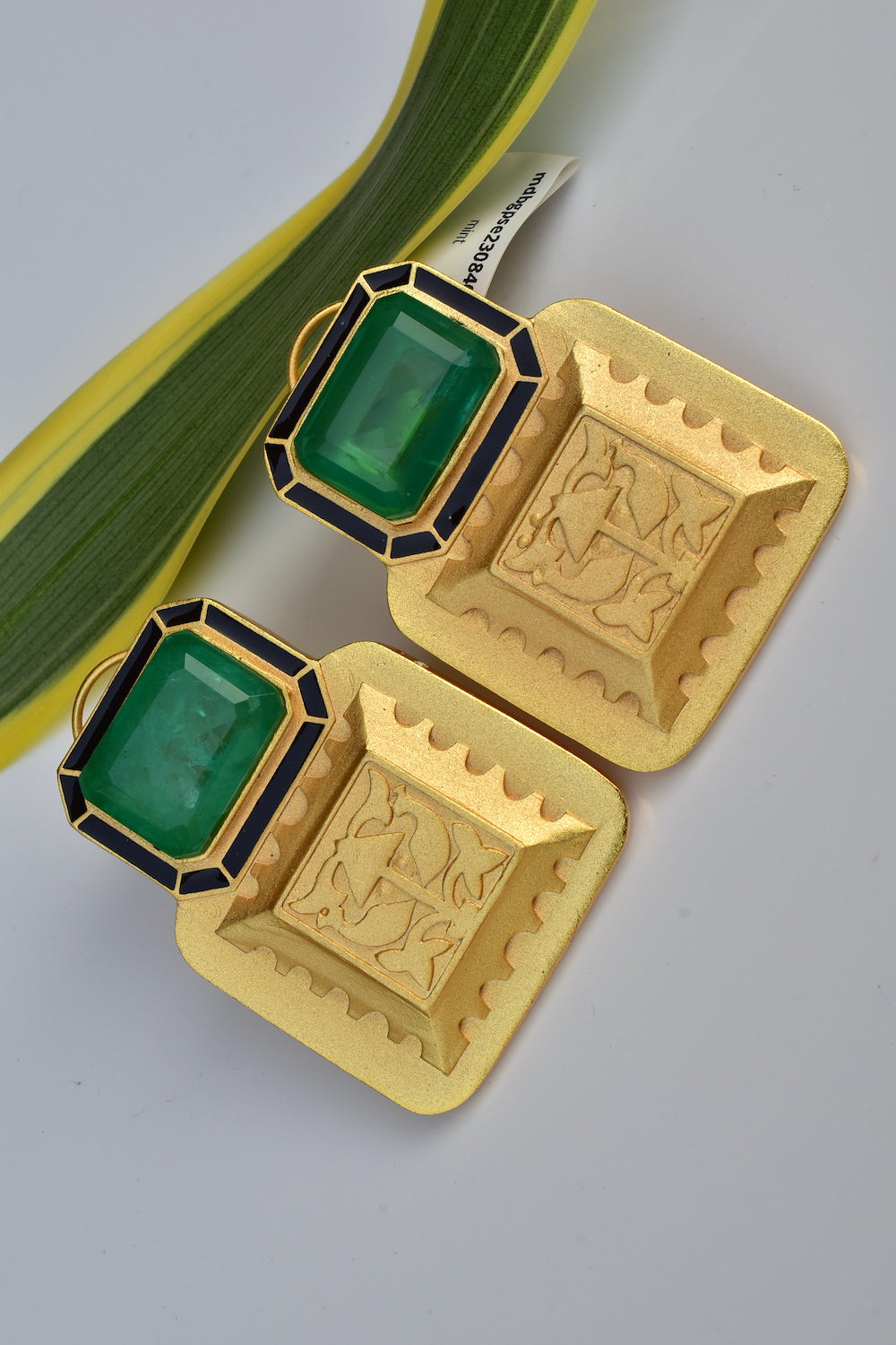 light green doublet with enamel studs