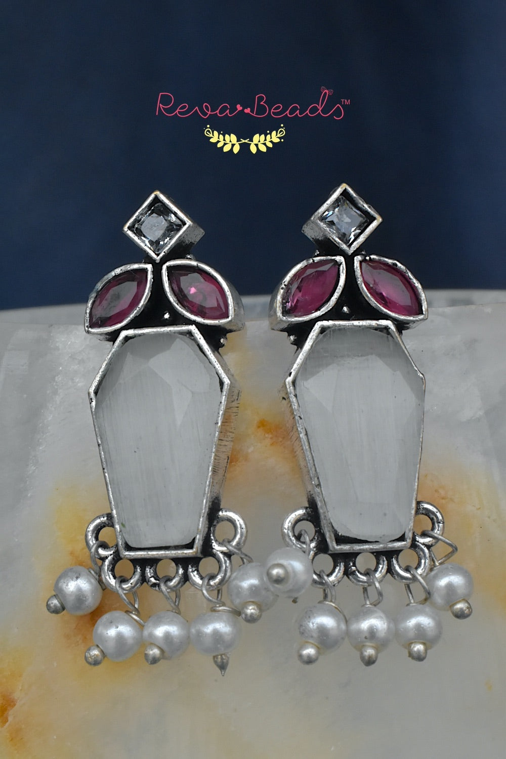 tiny oxidised studs