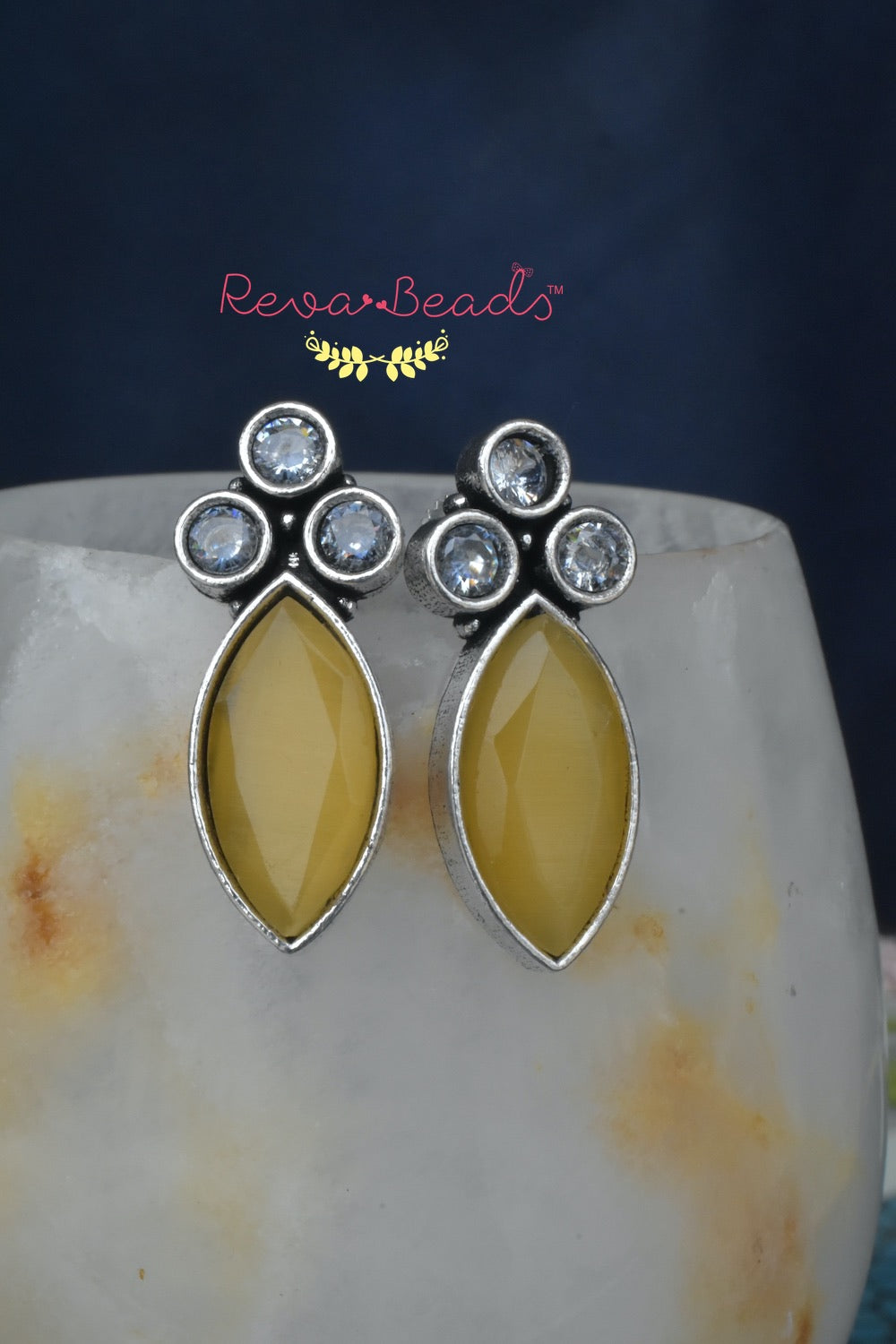 yellow white stone studded
