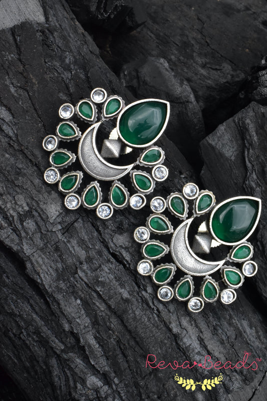 green stud earrings