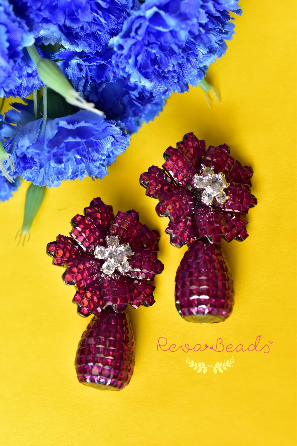 invisible settings drop earrings ruby