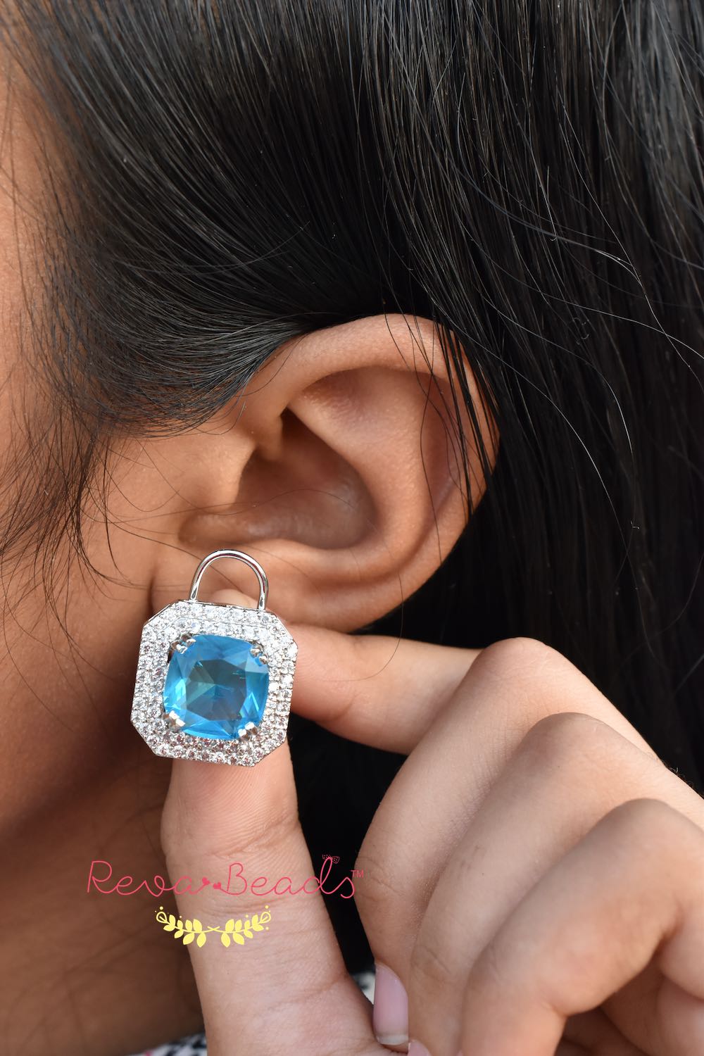 light blue stud