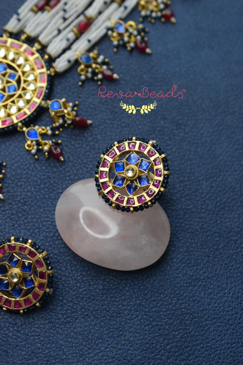 blue pink finger ring