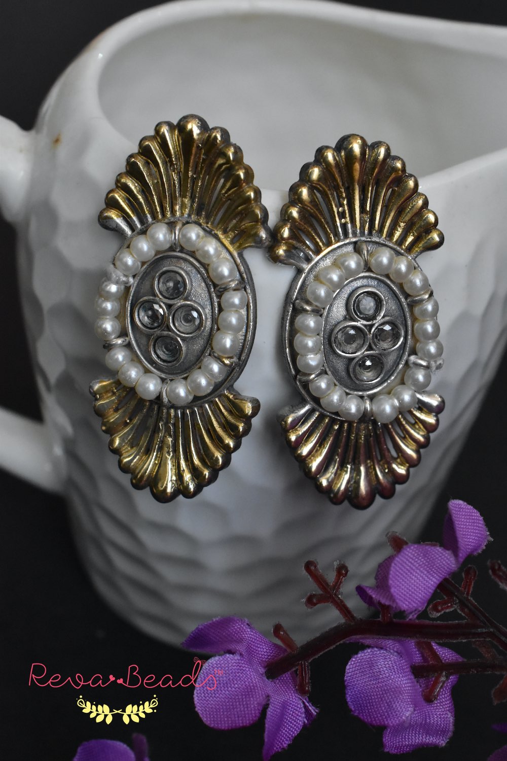 dual tone stud earrings