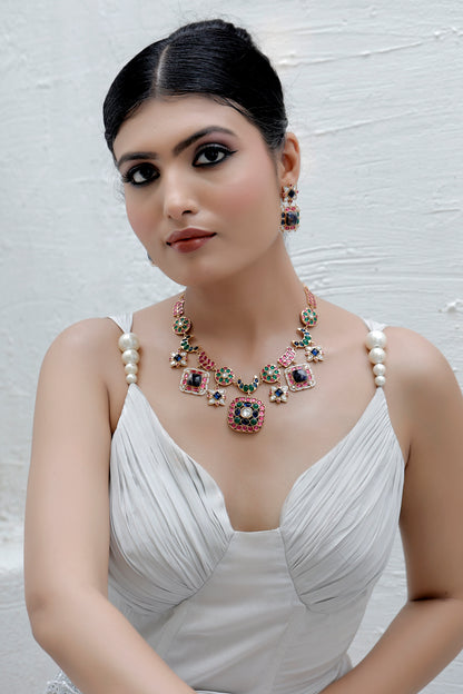 semi precious lapis lazuli sodalite with green and pota ruby kundans in matte gold polish unique middle length necklace with drop earrings