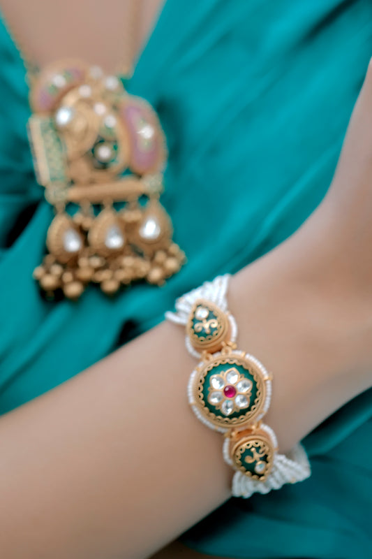 model wearing heritage rajawadi antique finish bracelet with pearl layers
