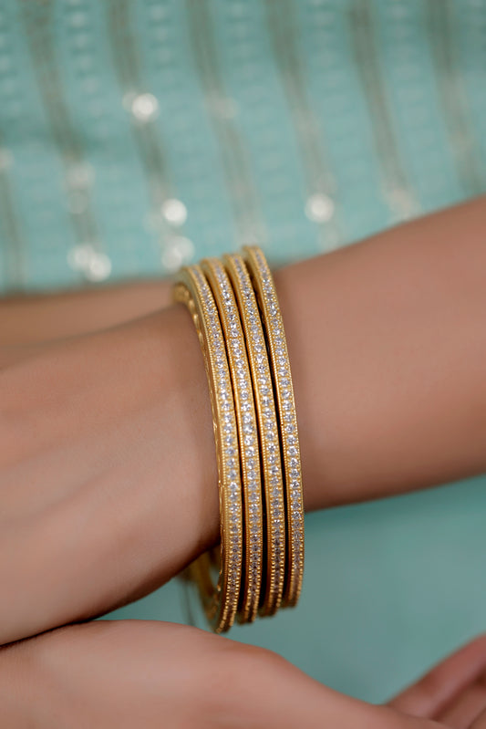set of four cz gold bangle