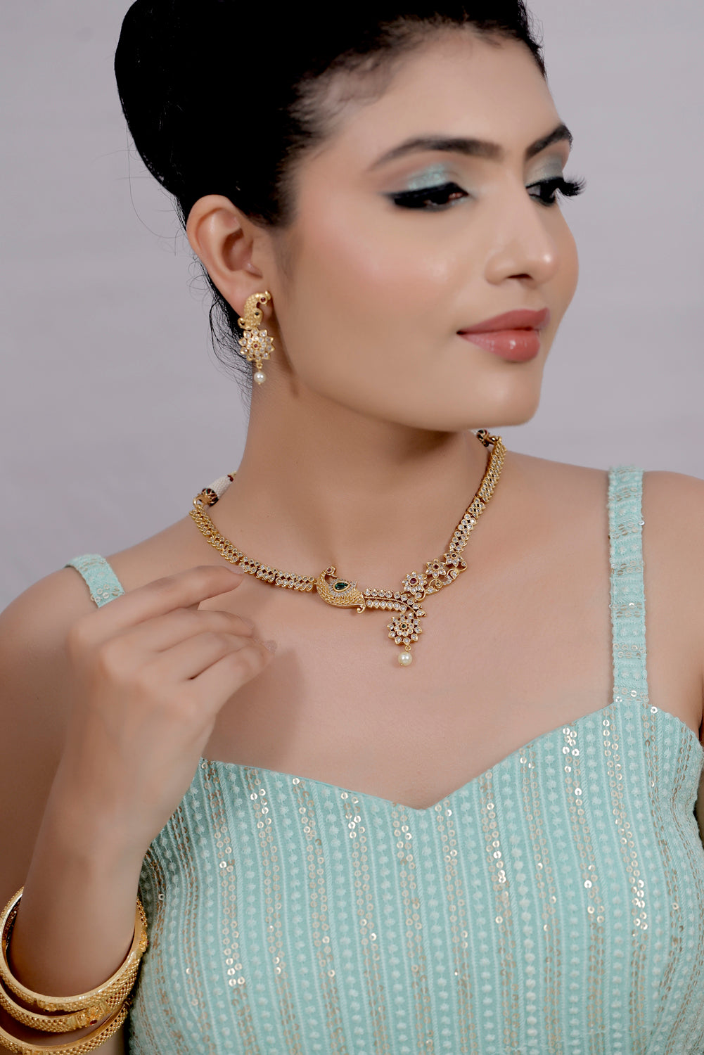 peacock gold necklace