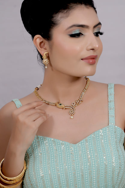 peacock gold necklace