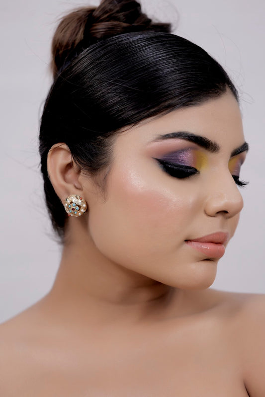 jadau stud earrings