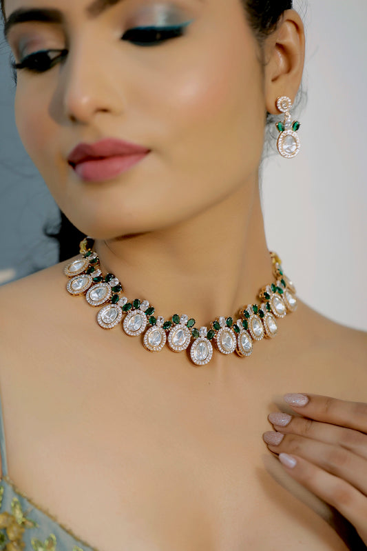 model wearing mossanite tyaani kundan emerald green choker necklace with cubic zirconia and drop earrings set