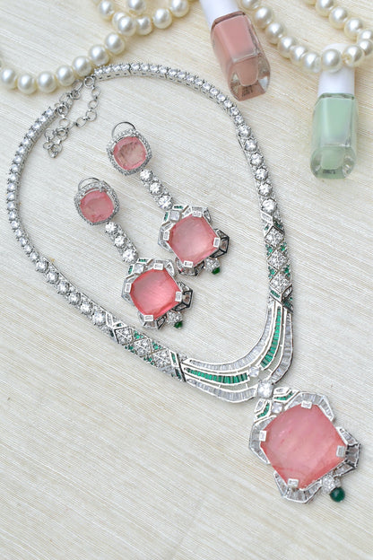 Necklace with american diamonds, pink stones and green accents in silver finish