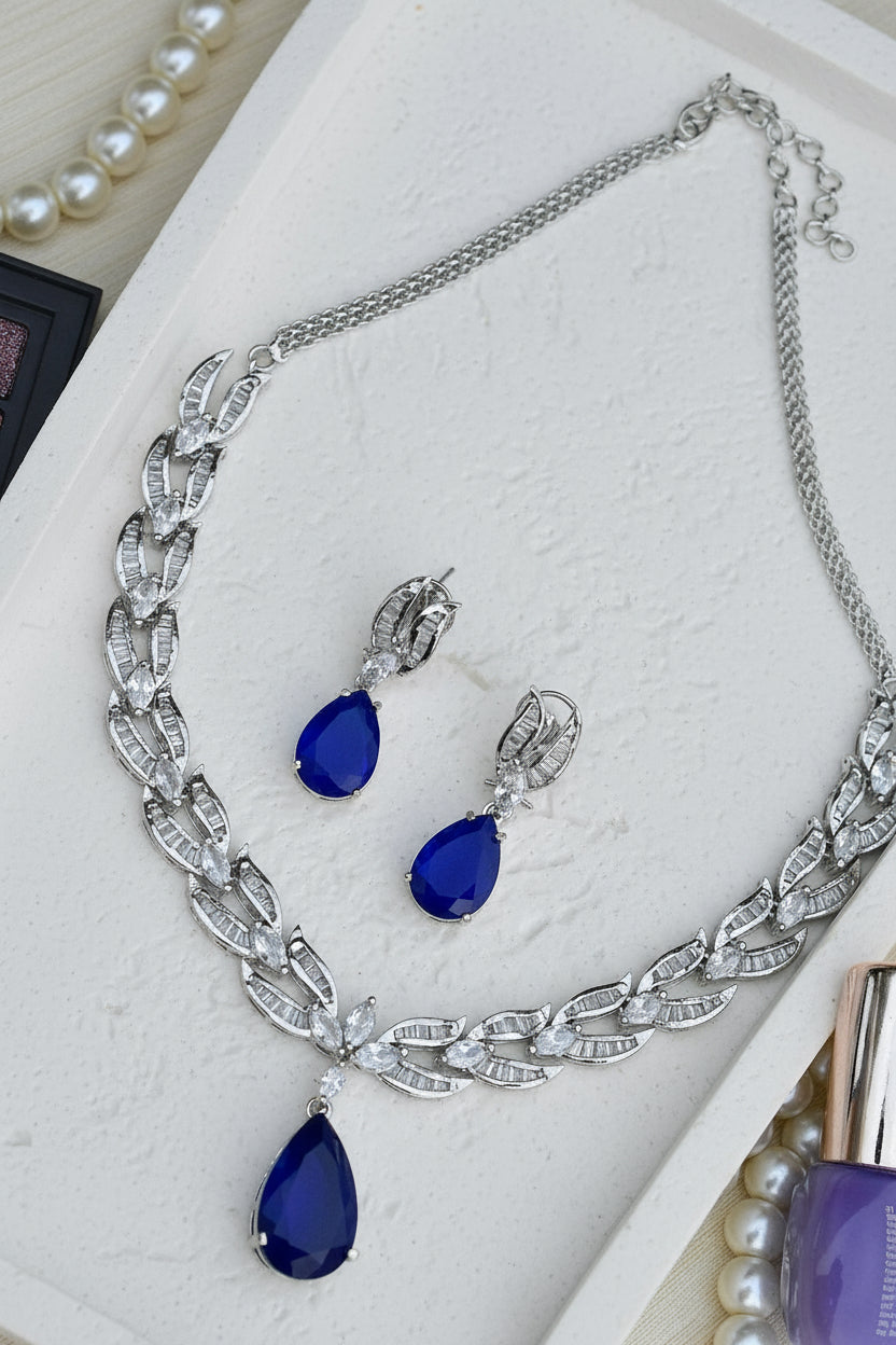 blue doublet necklace earrings