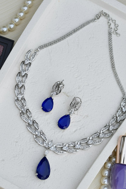 blue doublet necklace earrings