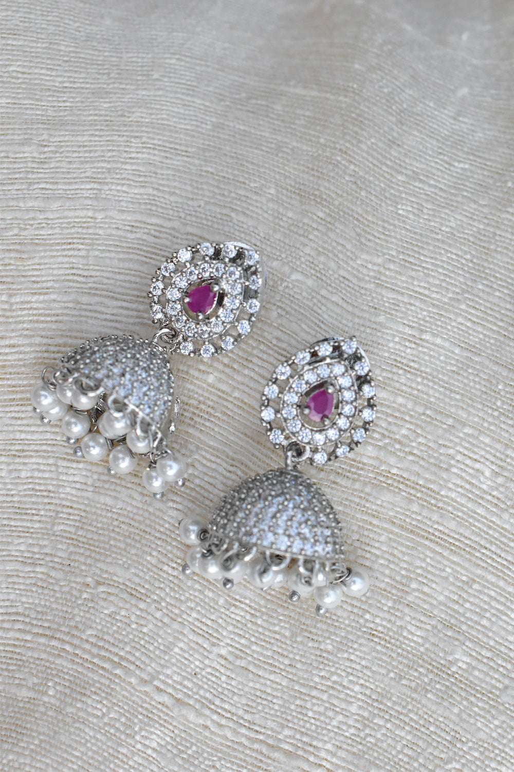 Silver earrings with pink gemstones