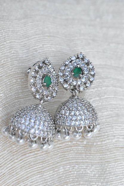Silver earrings with green gemstones