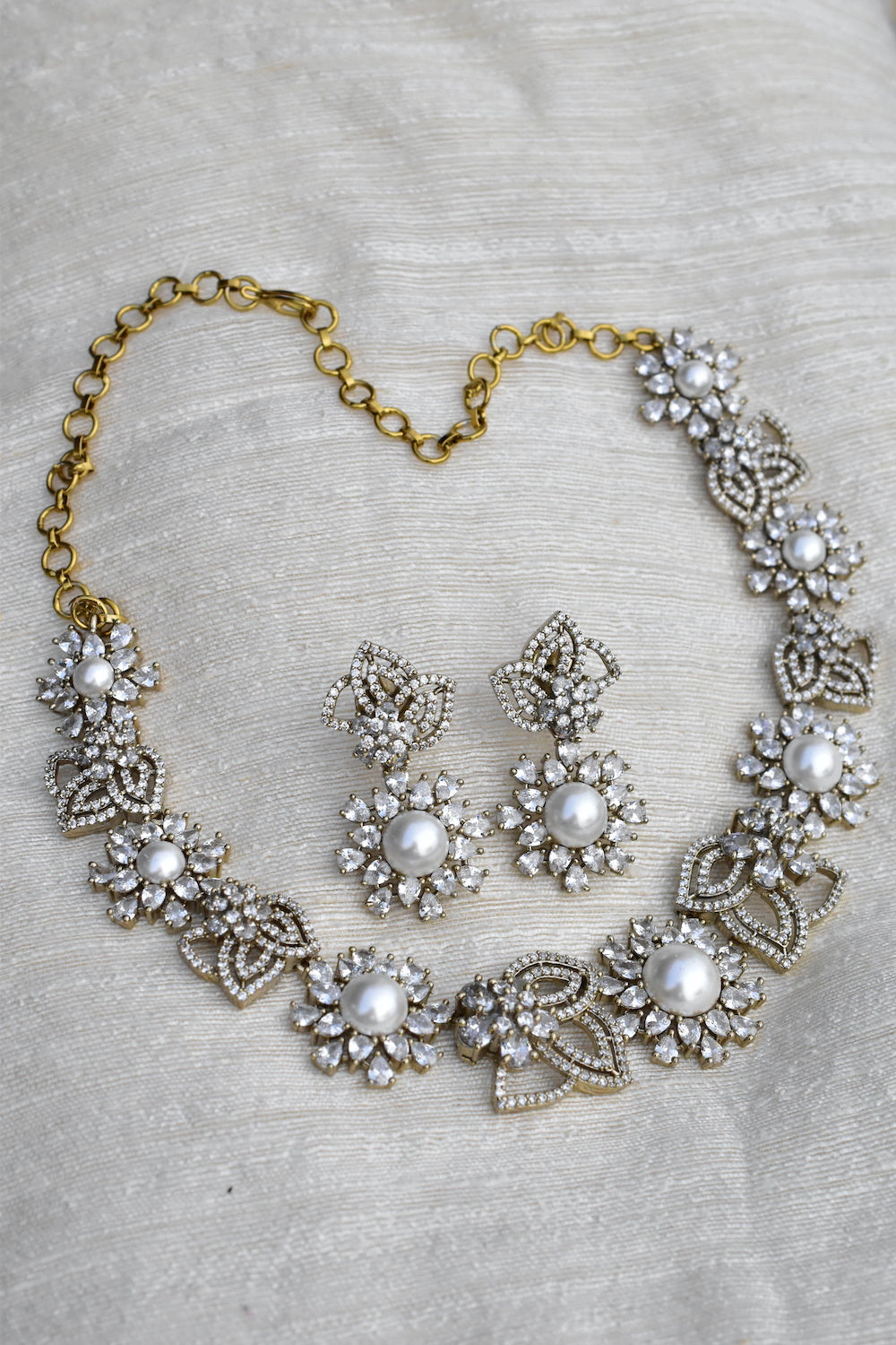 Diamond pearl necklace earrings