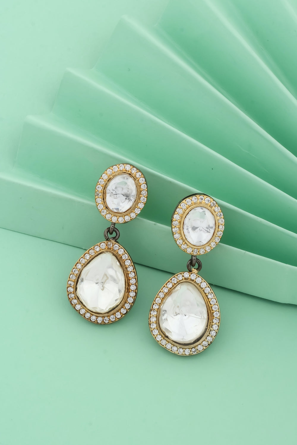 black polish drop earrings with dual tone gold black polish and cubic zirconia stones