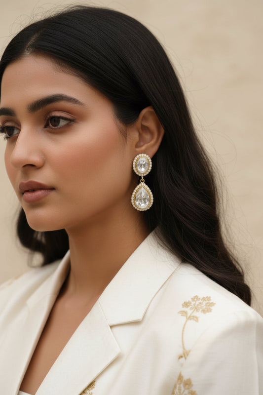 black polish drop earrings with dual tone gold black polish and cubic zirconia stones