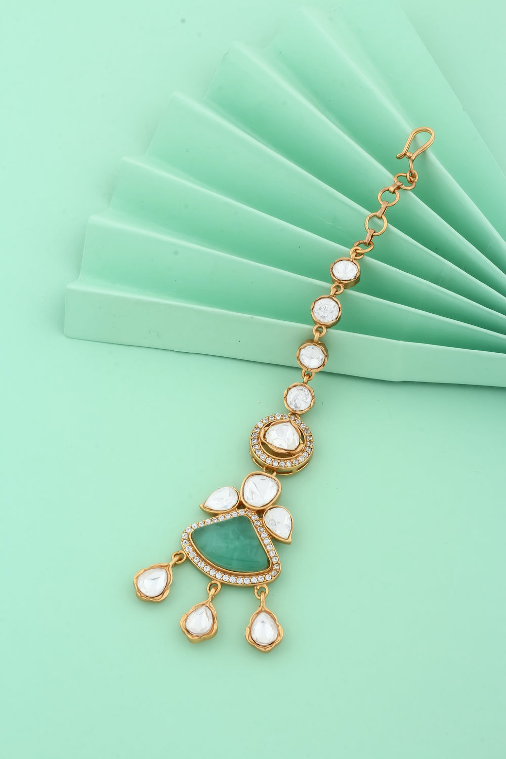 mint stone kundan maang tika with antique gold finish indian jewellery