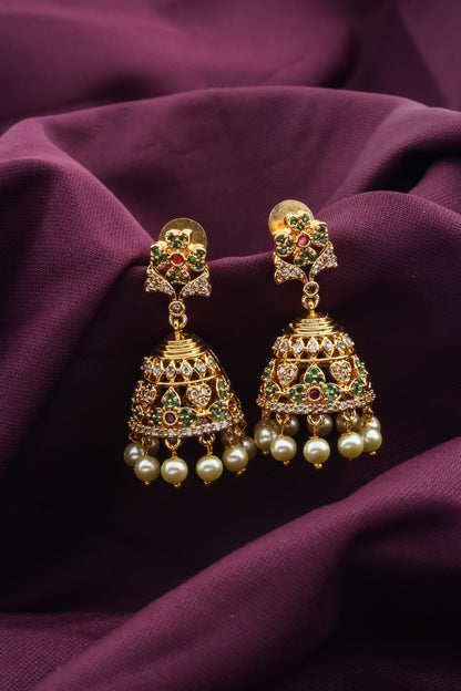 Ad zircon antique gold finish delicate jhumka earrings