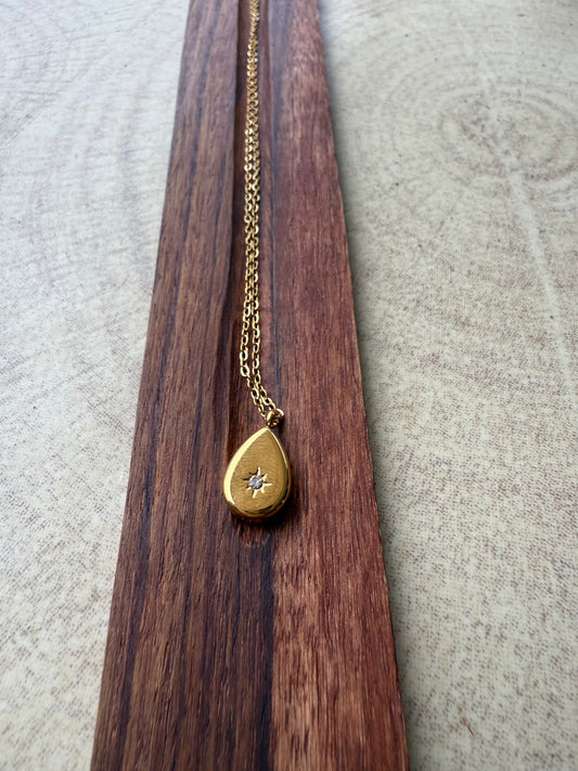 cz stone studded stainless steel drop pendant chain in gold finish minimal 250167