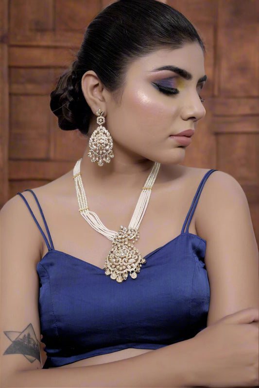 model wearing pearl jadau Hyderabad necklace earrings set