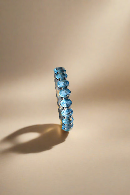 blue topaz finger band