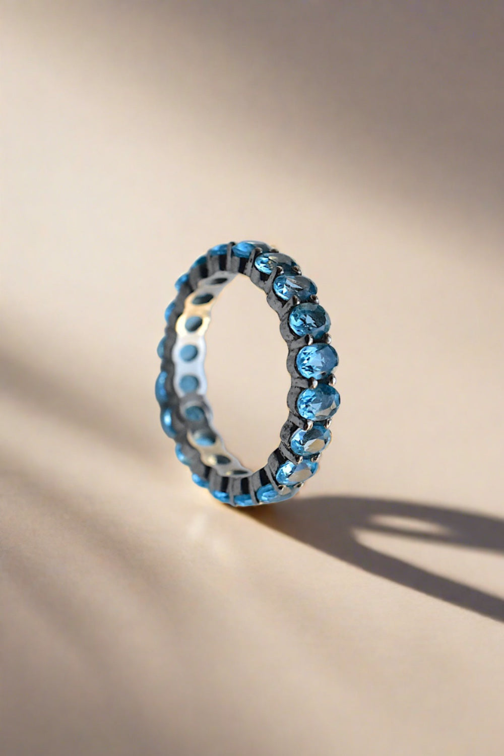 blue topaz finger band