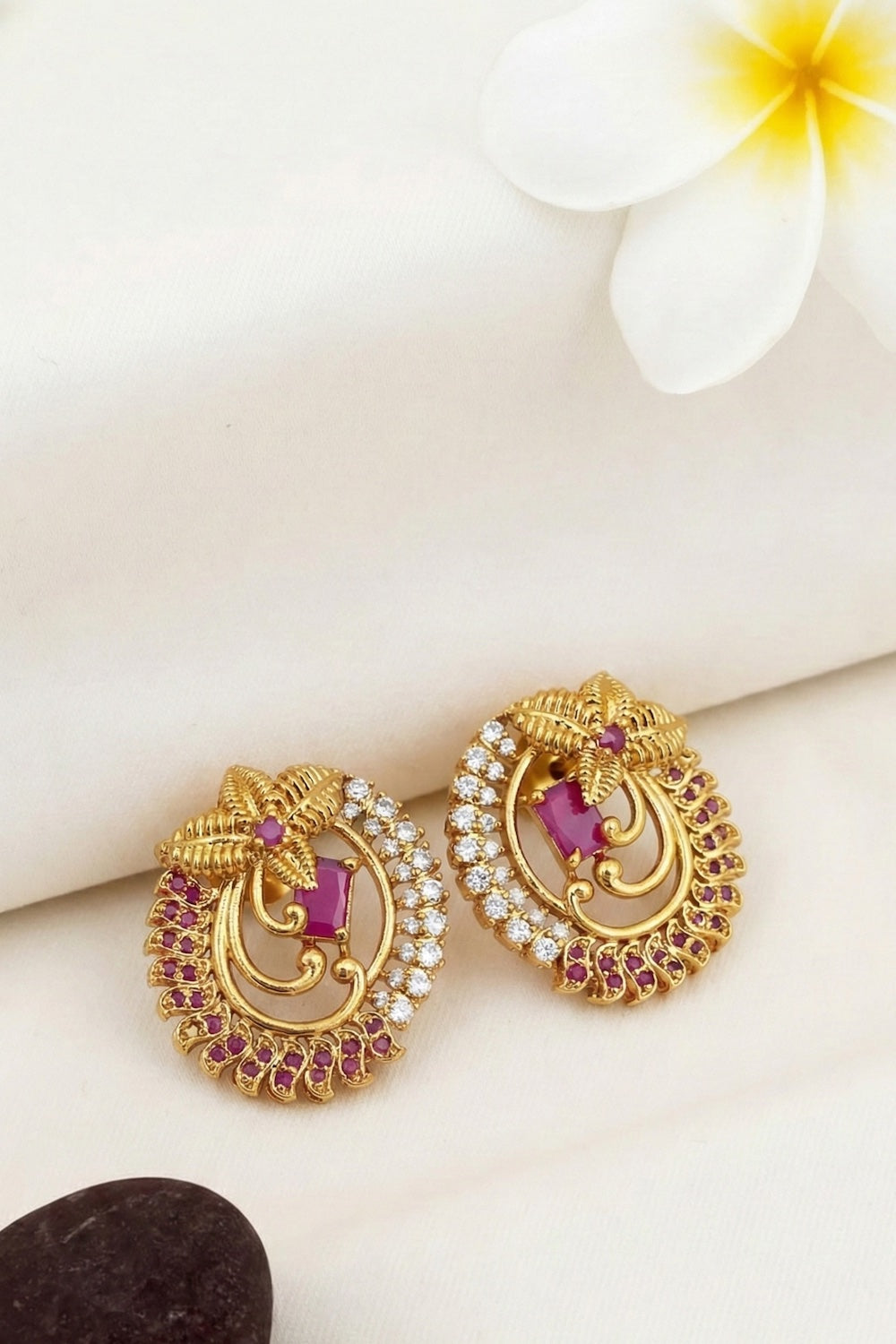 temple studs gold ad