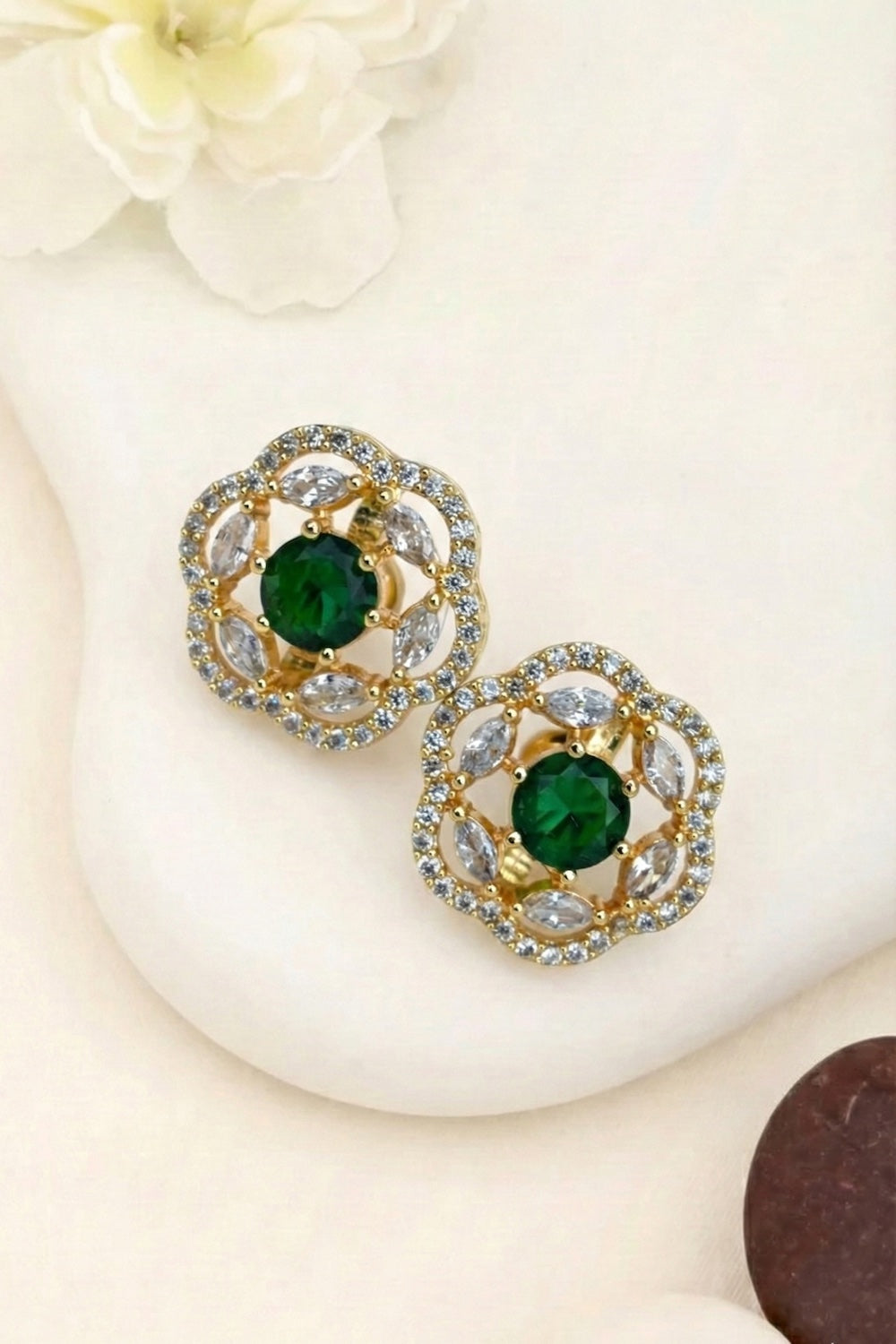 Pair of gold earrings with green gemstones and diamonds 