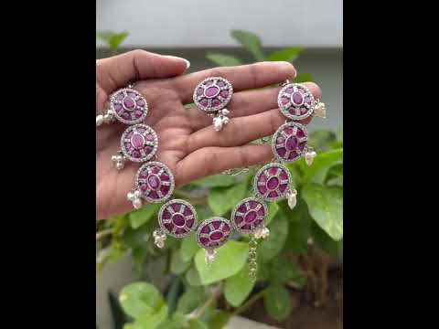 ad studded ruby stone