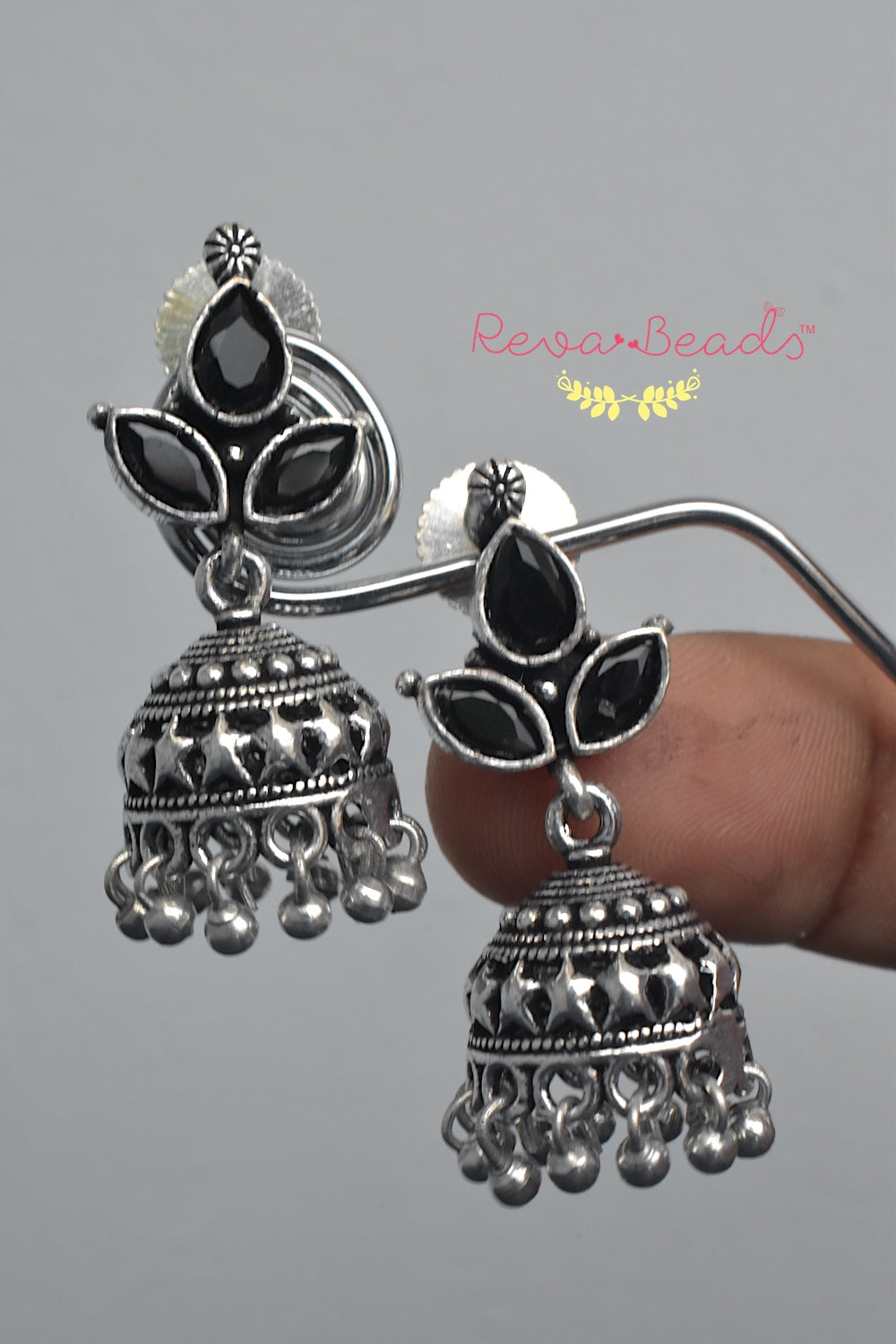 This elegant looking white earrings goes well on Kurtis. | gintaa.com