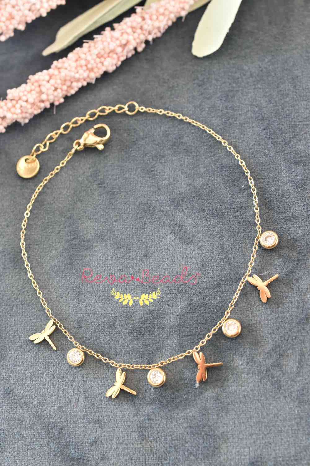 YouBella Stylish Party Wear Jewellery Gold Plated Charm Bracelet for Women ( Golden)(YBBN_91503)