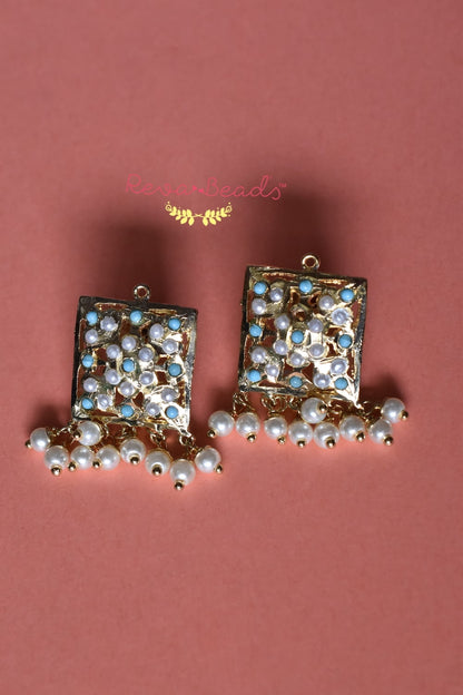 jadau stud earrings